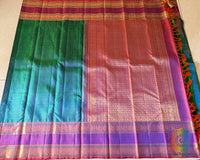 Open view of Peacock Green Kanjivaram Handloom Silk Saree showcasing its rich zari work