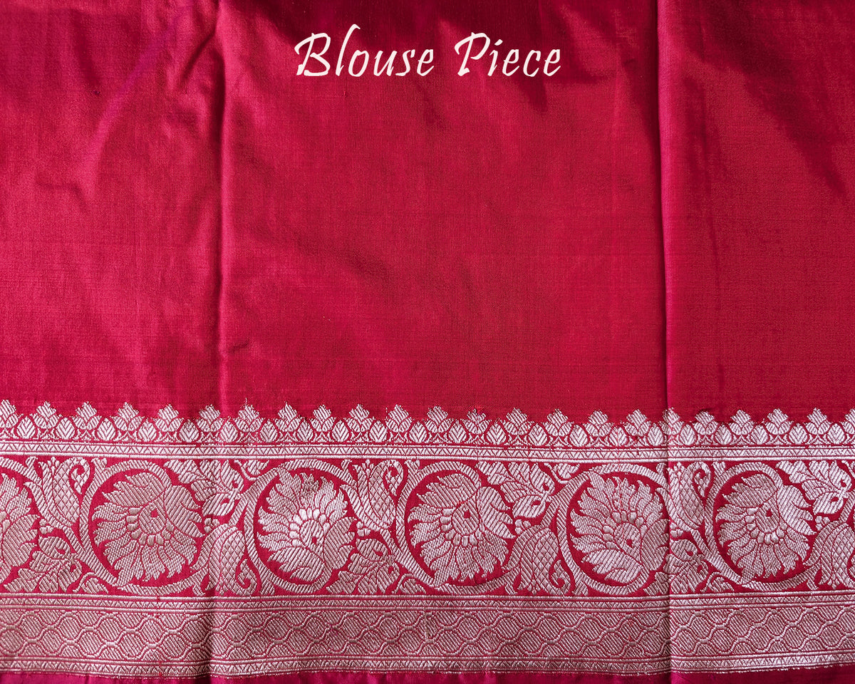 Matching blouse piece in pink shaded red Banarasi Katan silk fabric showing woven detailing
