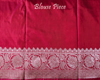 Matching blouse piece in pink shaded red Banarasi Katan silk fabric showing woven detailing