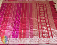 Full pink shaded red Banarasi Katan silk saree laid open showing overall design