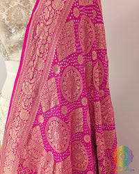 Close up of pink rai bandhej dupatta showing bareek bandhani and meenakari work