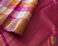 Pleats of the Pink Gold Checked Pure Kanjivaram Silk Saree highlighting the vibrant checked design and graceful silk drape