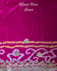 Close-up of the matching blouse sleeve with coordinated Gota Patti detailing