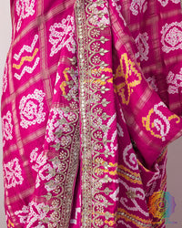 Detailed border featuring Gota Patti handwork on the Rani Pink Gaji Silk Gharchola Saree