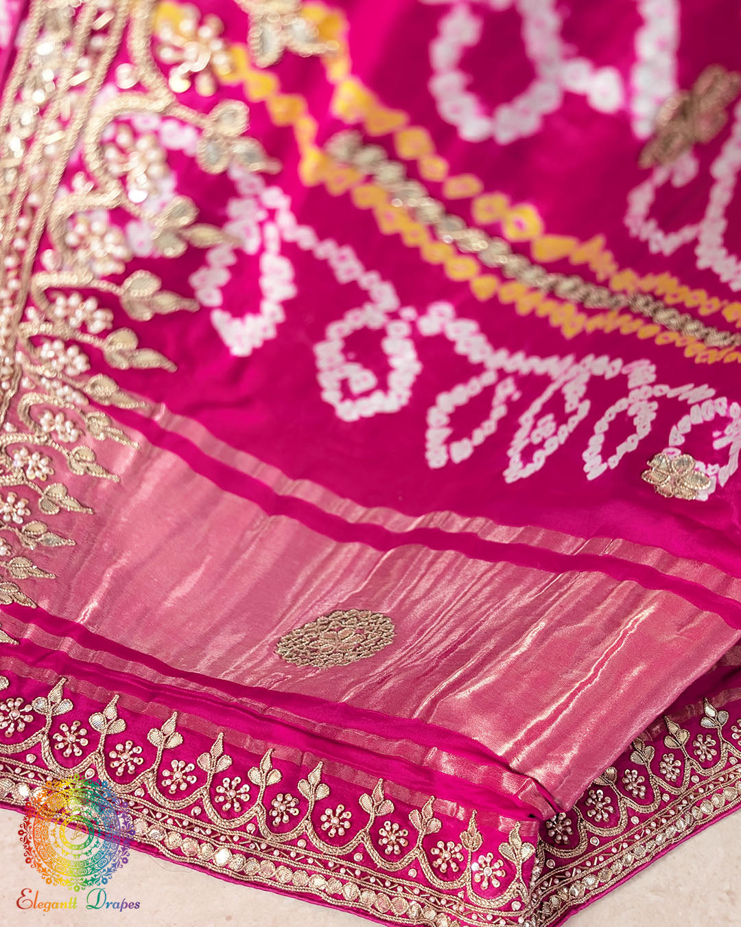 Full pallu view of the Rani Pink Gharchola Saree with traditional Bandhani check pattern