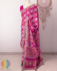 Side view of the Rani Pink Gaji Silk Gharchola Saree showcasing its elegant drape