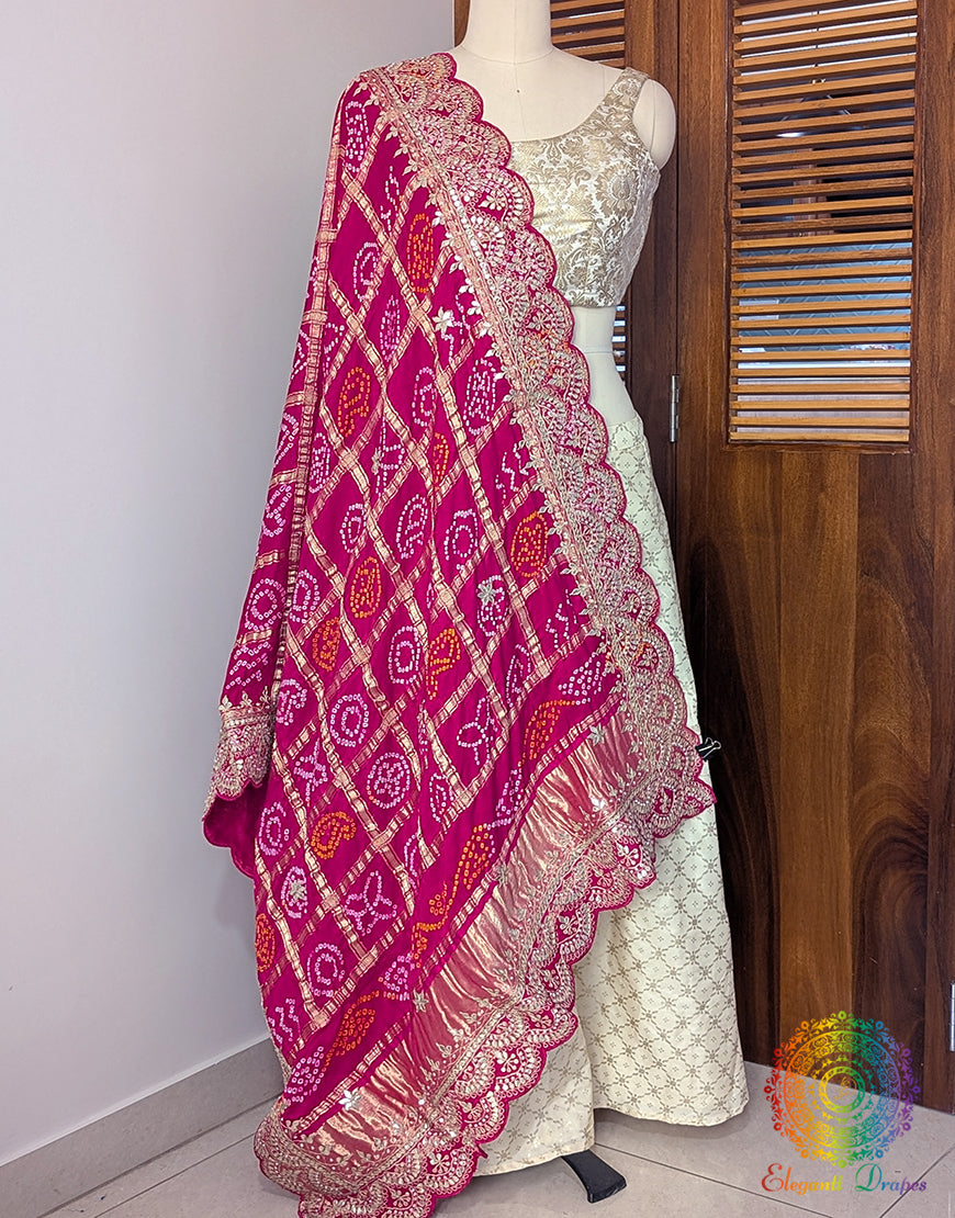 Rani pink gaji silk bandhani dupatta with gota patti scalloped border Elegantt Drapes
