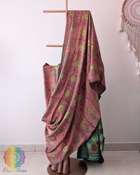 Terracotta Pink Modal Tussar Saree draped with natural dyed botanical motifs