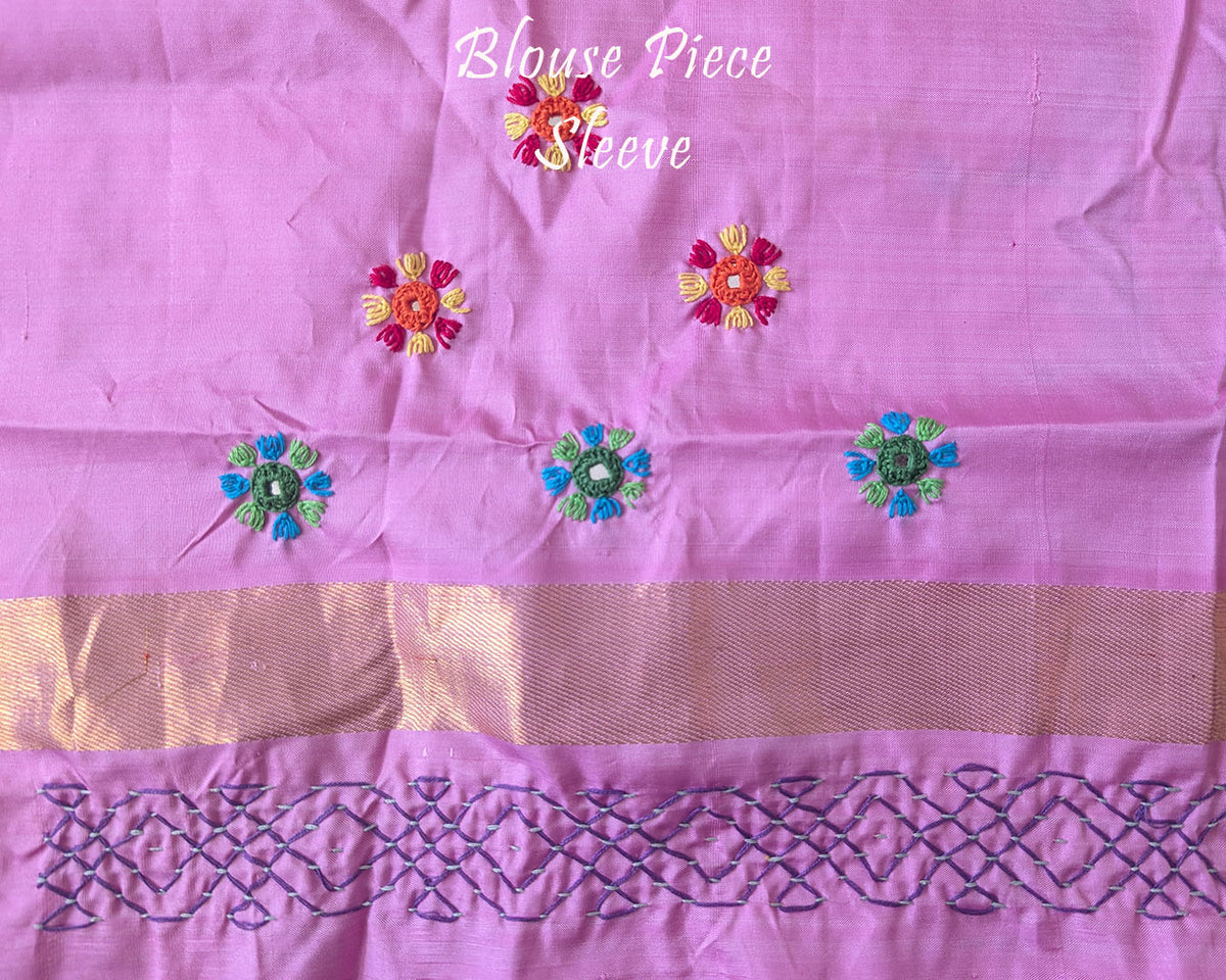 Blouse sleeve detail for the Pastel Pink Kanjivaram Silk Saree with Sindhur Lambani Handwork, highlighting the decorative stitching and handcrafted embellishments.