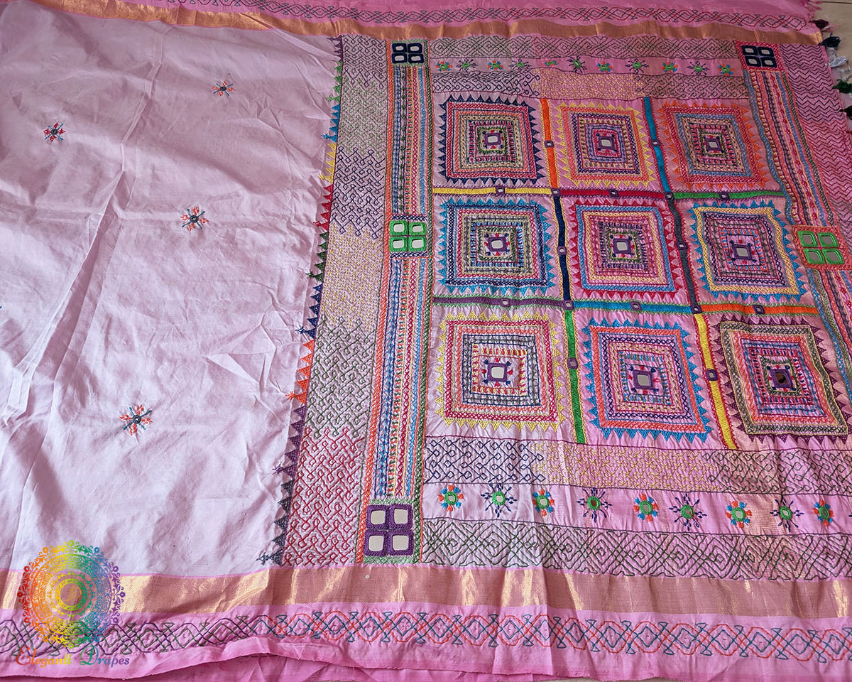 Detailed view of the Pastel Pink Kanjivaram Silk Saree border with Sindhur Lambani Handwork, showcasing the decorative embroidery and rich traditional detailing.