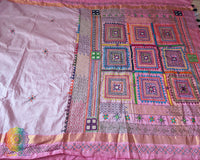 Detailed view of the Pastel Pink Kanjivaram Silk Saree border with Sindhur Lambani Handwork, showcasing the decorative embroidery and rich traditional detailing.