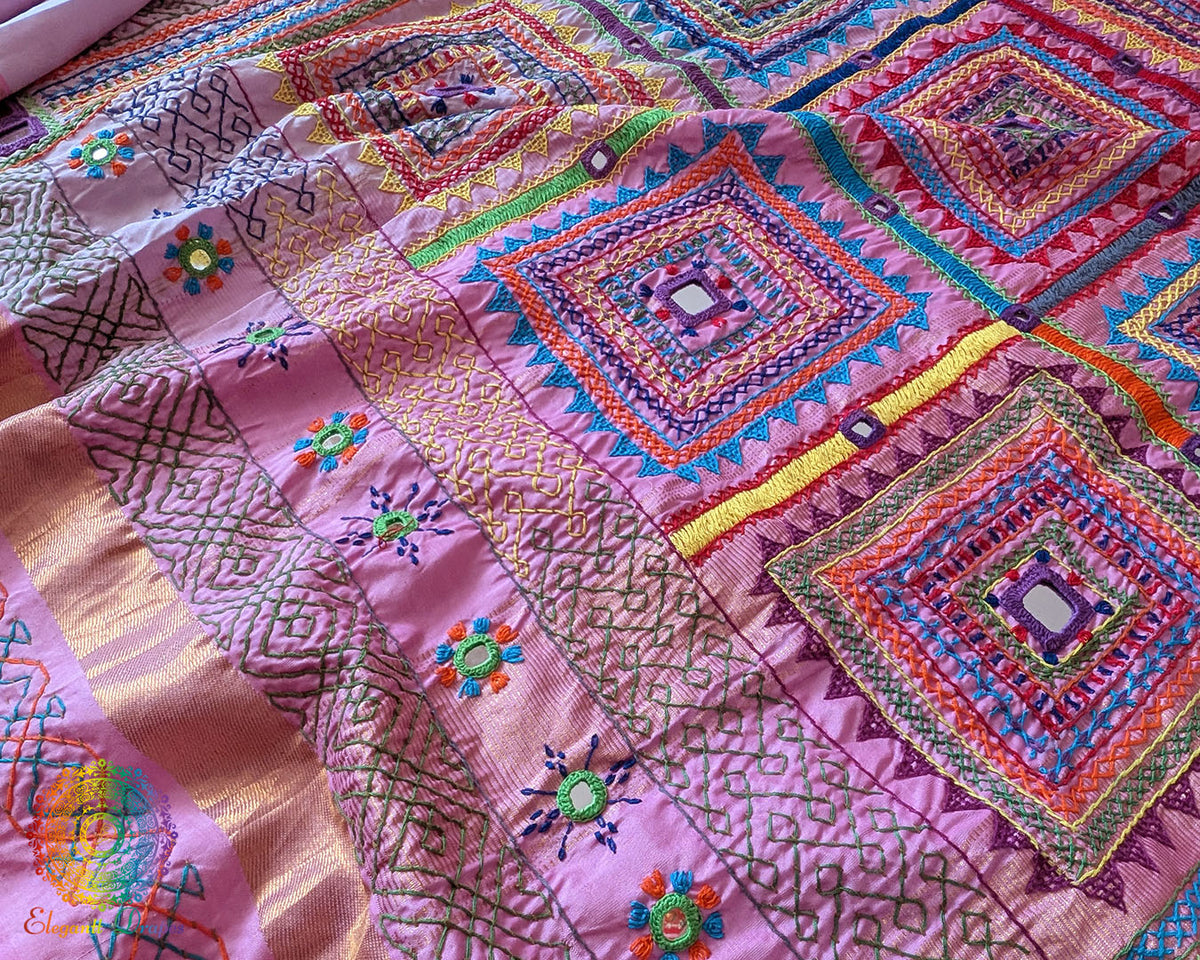 Pastel Pink Kanjivaram Silk Saree with Sindhur Lambani Handwork featuring a detailed view of the saree palla, highlighting the colourful Lambani embroidery and traditional design.