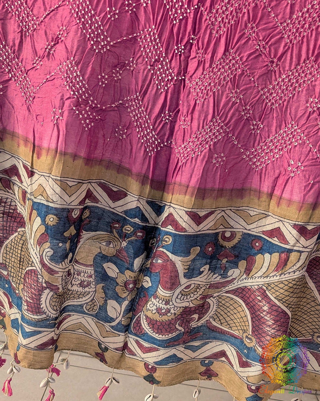Close-up of the hand-painted Kalamkari border on the Onion Pink Muga Silk Dupatta
