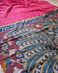 Close-up of the traditional Bandhani-dyed body on the Pink Muga Silk Saree
