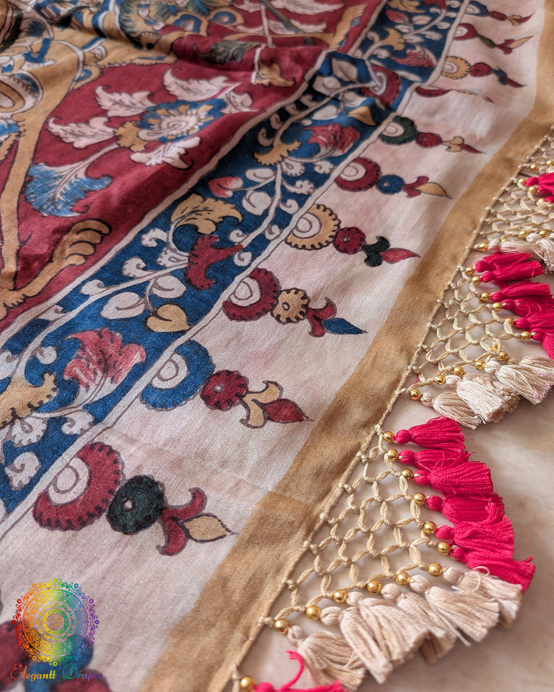 Close-up of the Kalamkari pallu with heavy tassels on the Pink Bandhani Kalamkari Muga Silk Saree