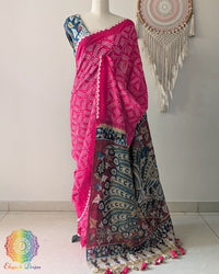 Pink Bandhani Kalamkari Muga Silk Saree showcased on a mannequin highlighting its elegant drape and traditional craftsmanship