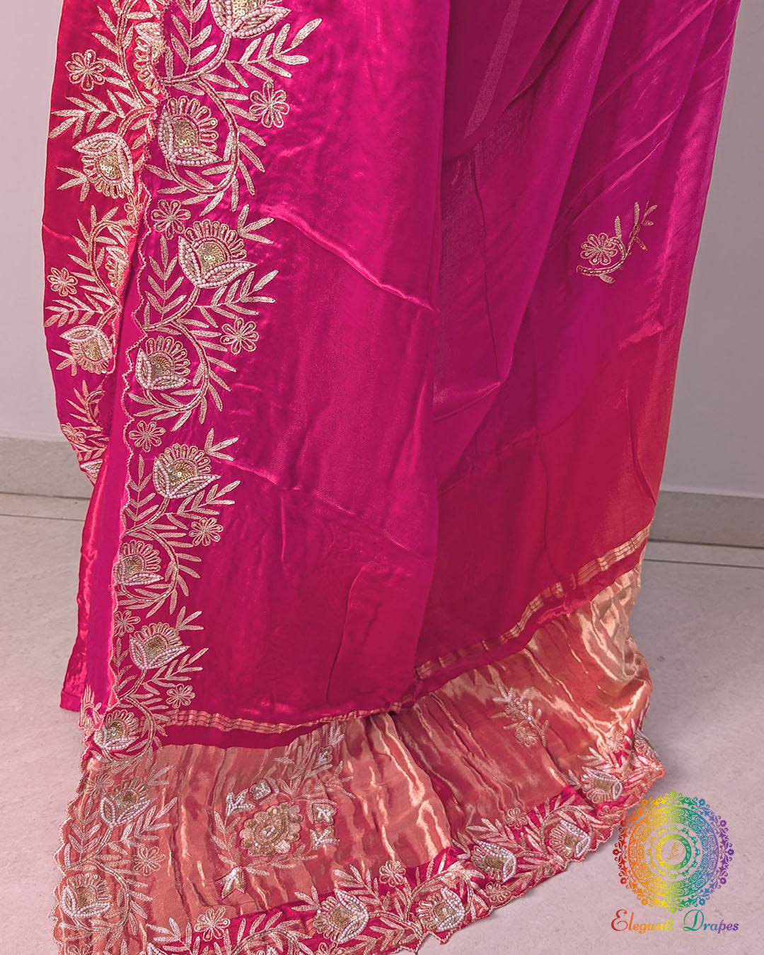 Dabka embroidery detail on pink orange silk saree