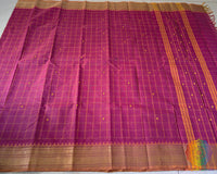 Full pink Kanchi cotton checkered saree laid open showcasing overall design and drape