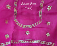 Pink Organza Leheria Saree – Blouse back view featuring the coordinated Organza fabric and matching traditional Kachha Gota detailing