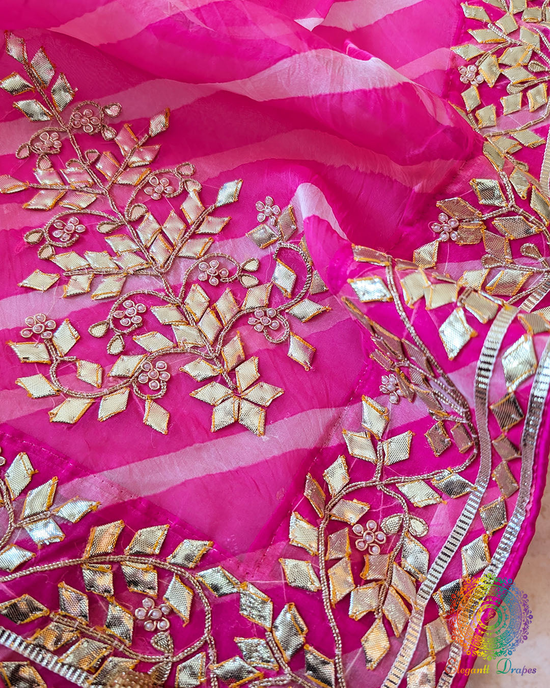 Pink Organza Leheria Saree – Detailed body view showcasing the soft pink colour, delicate Organza texture and traditional Kachha Gota work