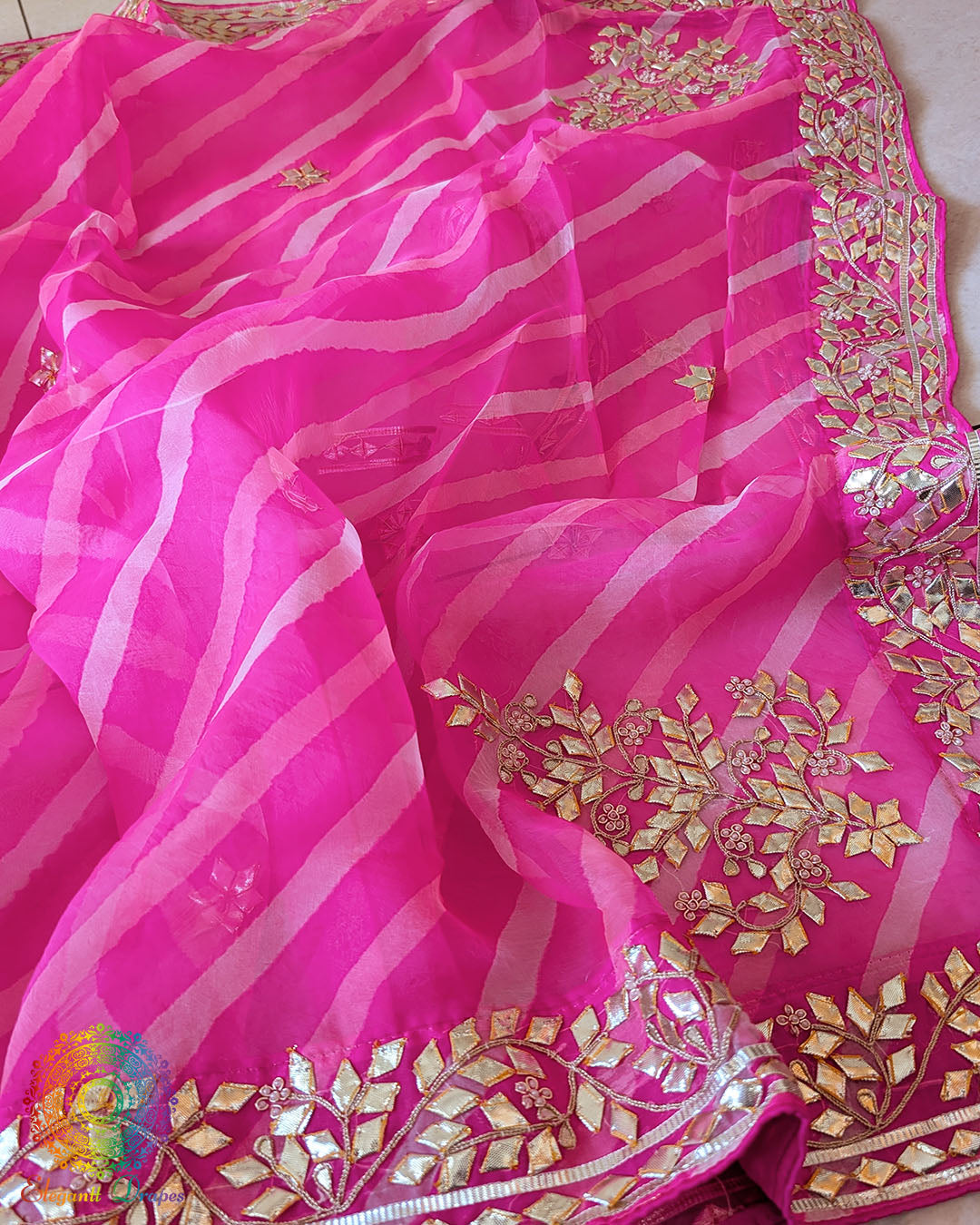 Pink Organza Saree – Detailed view of handcrafted Kachha Gota embellishment adding traditional shimmer to the delicate Leheria patterned body
