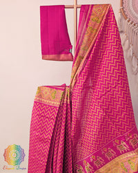 Rani pink pure mulberry silk Rajkot Patola saree close up
