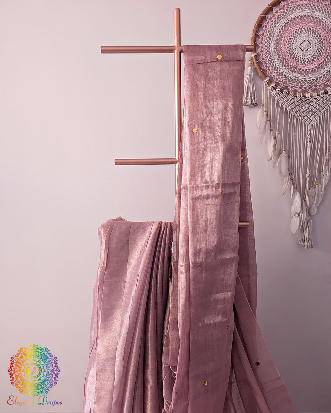 Close up of blush pink Bengal mul tissue saree with sequins work