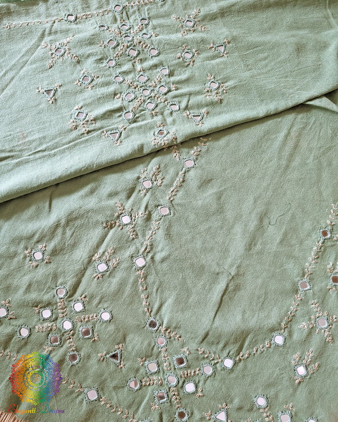 Pista Green Kala Cotton Kutch Mirror Handwork blouse piece featuring traditional thread embroidery and real mirror embellishments for a customised ethnic blouse.