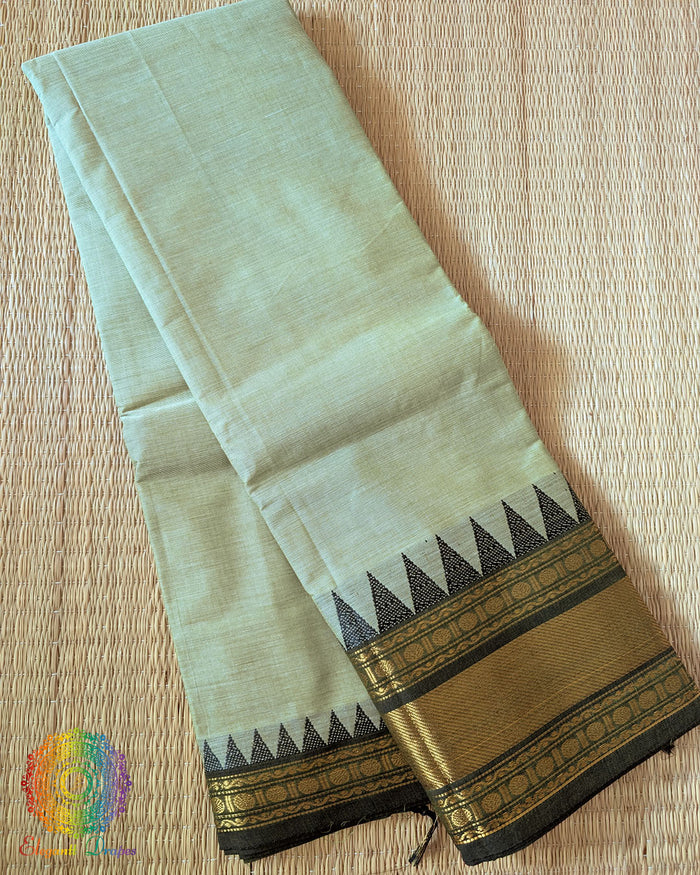 Folded mint green pure Kanchi cotton saree showing woven border detail