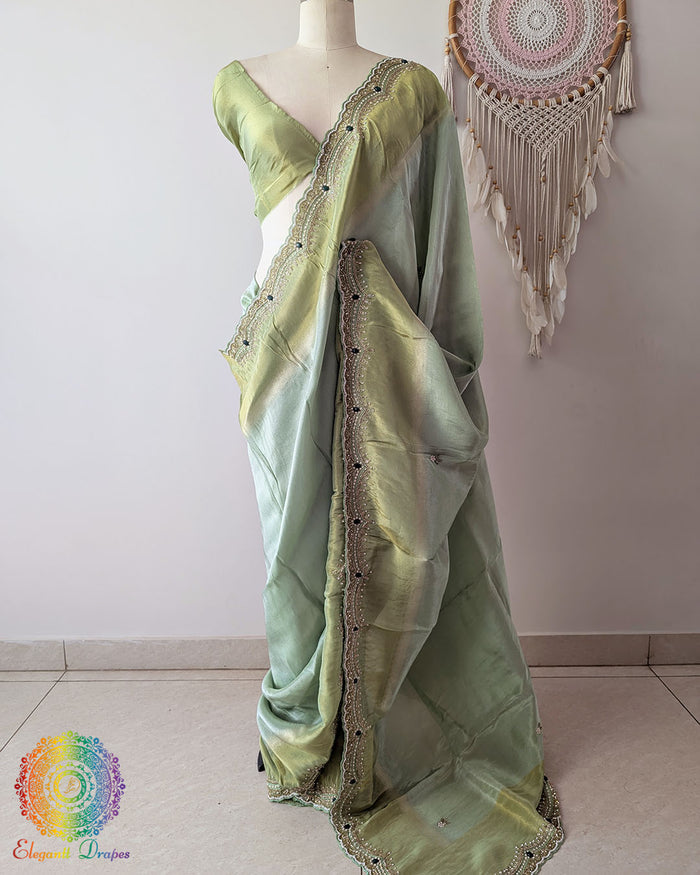 Grand palla view of Pastel Green Soft Tissue Silk Saree with Cutdana Handwork