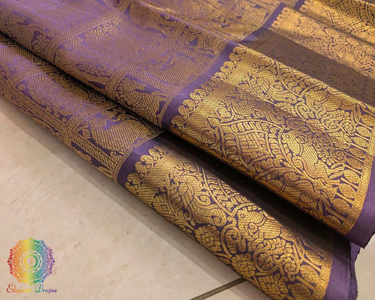 Bridal purple Kanjivaram silk saree traditional weave close up