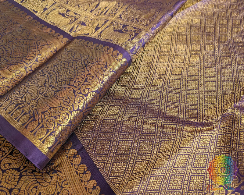 Purple handwoven Kanjivaram silk saree zari border detail