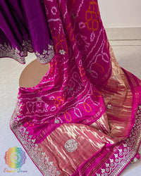 Open palla view of magenta gaji silk saree highlighting pink palla, gota patti border work, and Rasmandal motifs
