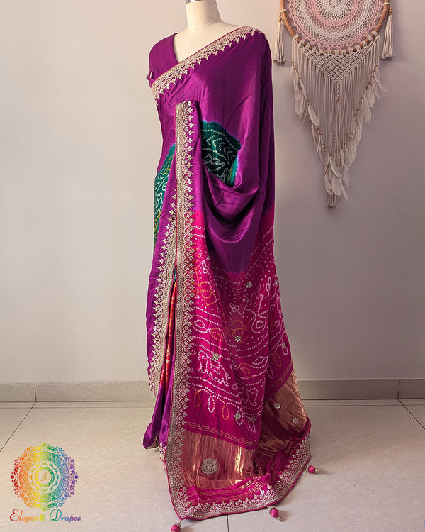 Side angle view of magenta gaji silk Rasmandal saree showcasing elegant silk drape