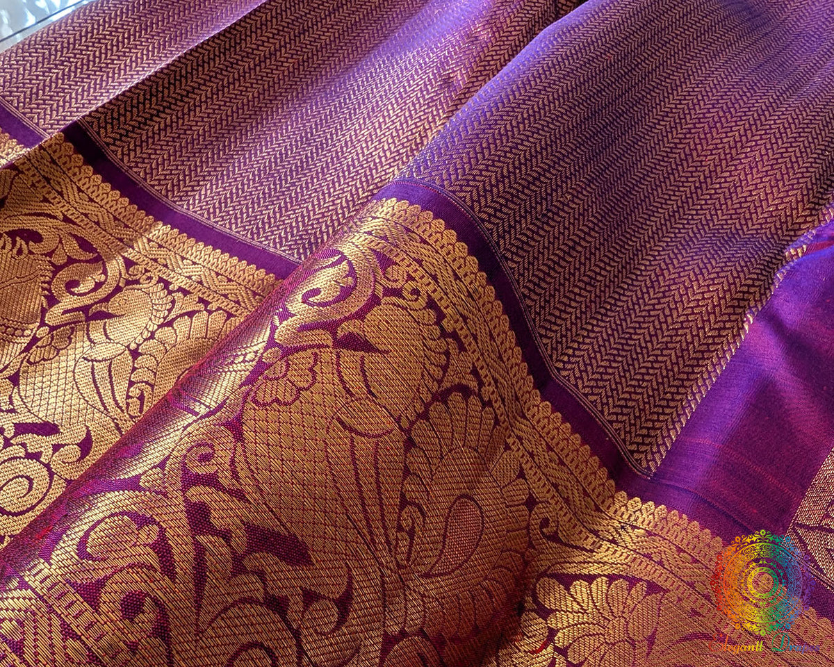 Detailed view of the woven 1-Gram Gold Zari border on the Purple Pure Kanjivaram Silk Saree