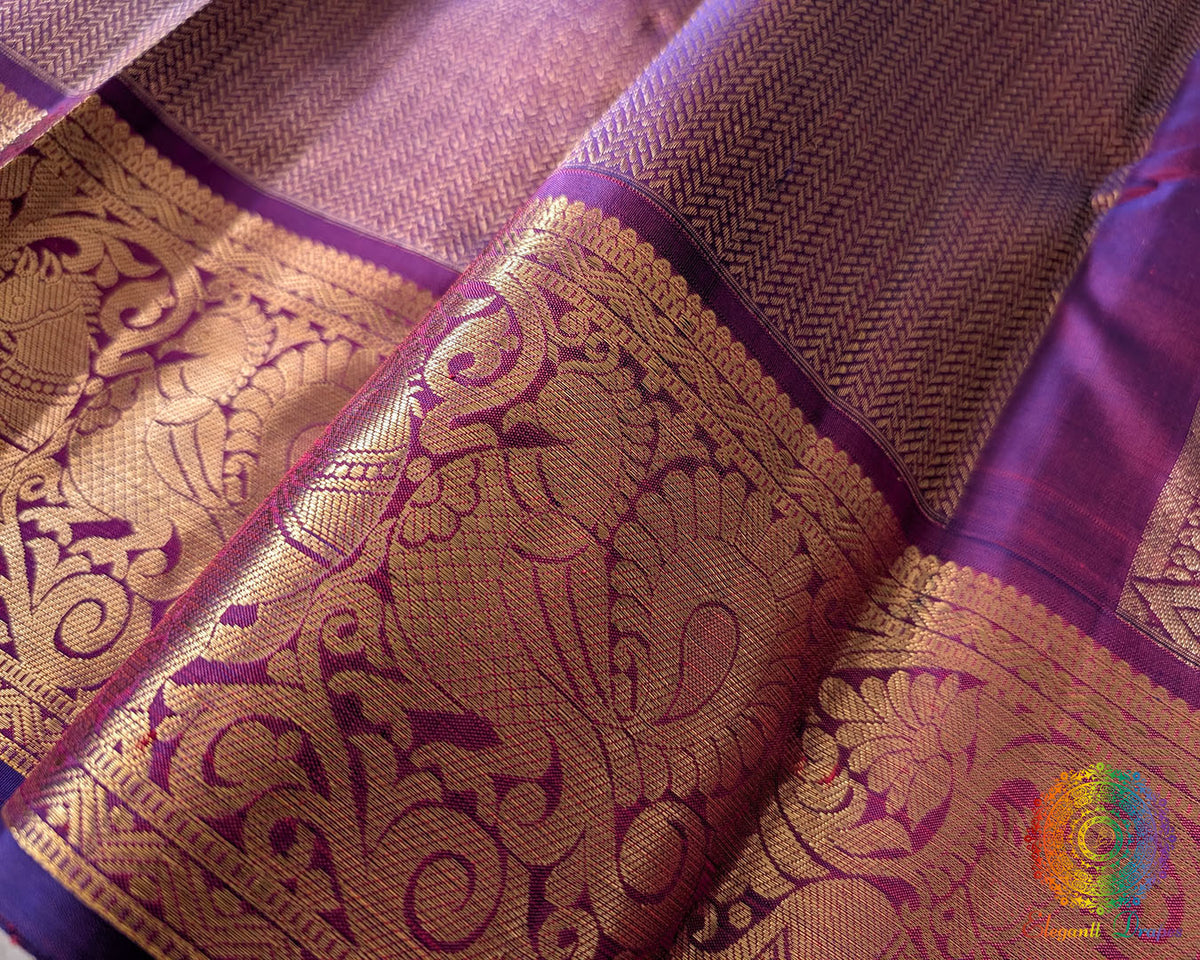 Detailed view of the woven 1-Gram Gold Zari border on the Purple Pure Kanjivaram Silk Saree