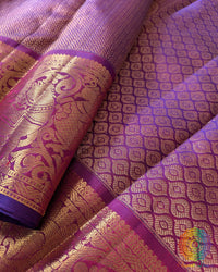Close-up of the rich silk weave and authentic 1-Gram Gold Zari on the Purple Pure Kanjivaram Silk Saree