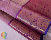 Close-up of the fabric showcasing the elegant weave and 1-Gram Gold Zari details of the Purple Pure Kanjivaram Silk Saree