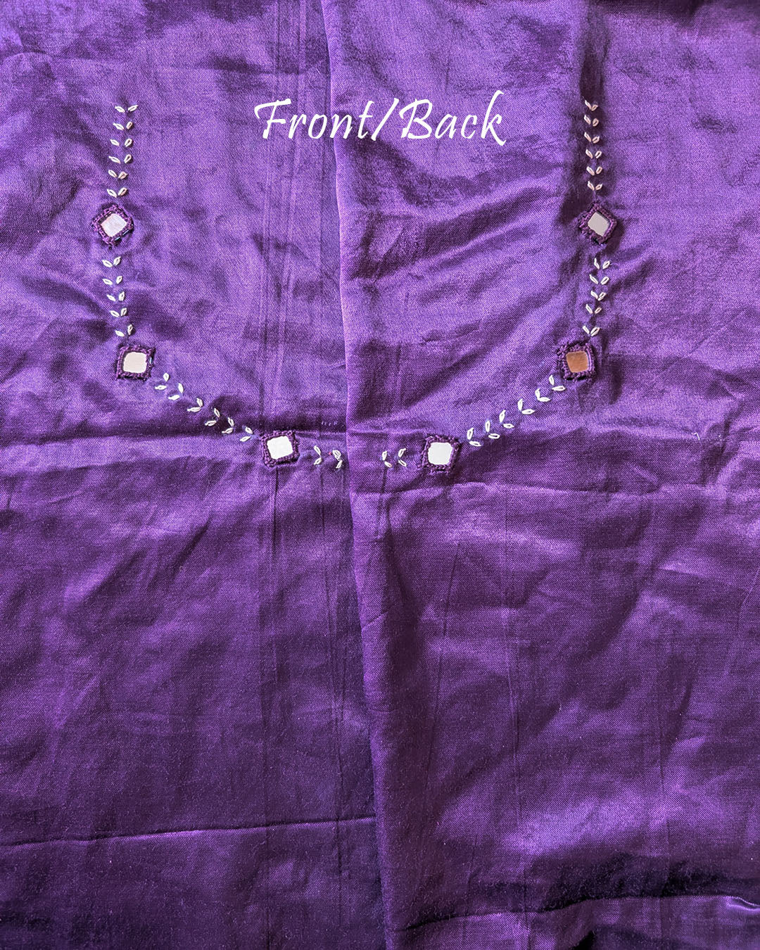 Back view of deep purple Mashru silk blouse piece highlighting handcrafted mirror embroidery