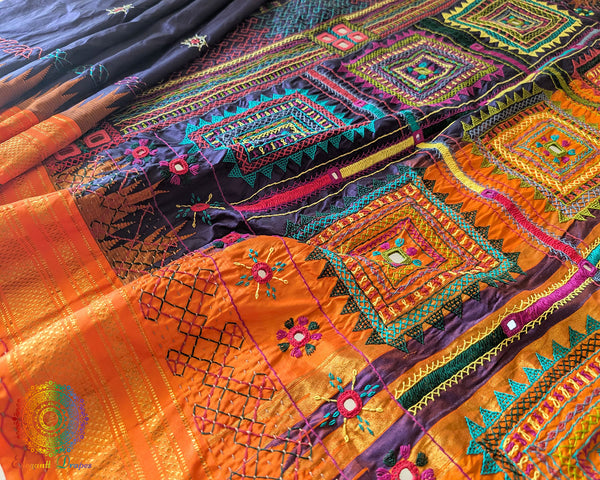 Blue Lambani embroidered Ilkal silk saree full layout view with orange accents