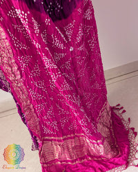 Intricate Nakshi woven border on purple pure gaji silk Bandhani saree