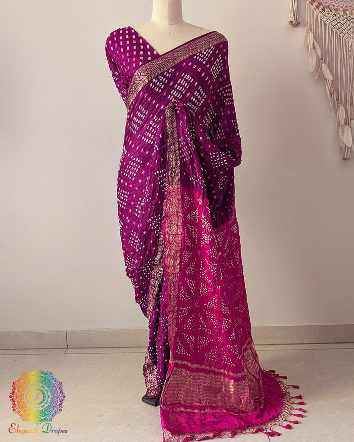 Purple pure gaji silk Bandhani saree on mannequin with pink palla and Nakshi woven border