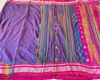 Detailed view of handcrafted Lambani embroidery on the purple Ilkal cotton saree