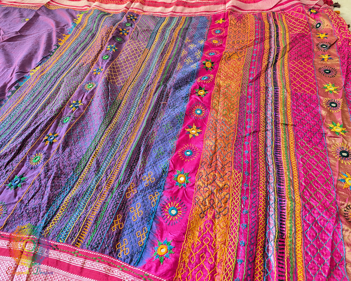 Close-up of traditional Lambani embroidered bootas across the Ilkal cotton saree