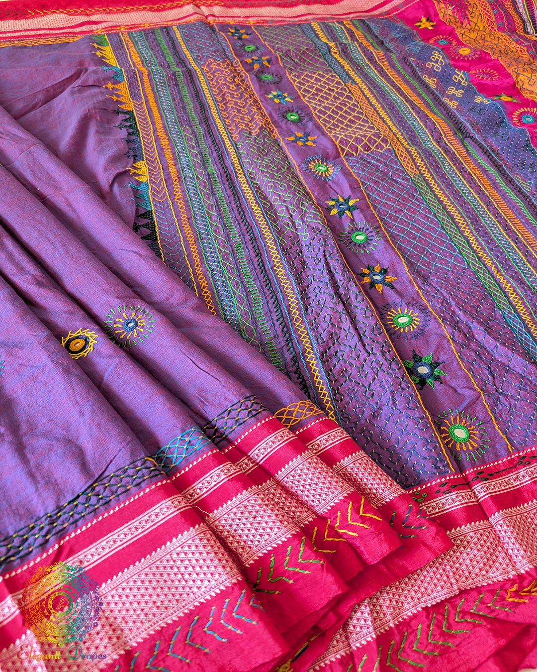 Full view of purple Ilkal cotton saree showcasing Lambani hand embroidery and elegant fall