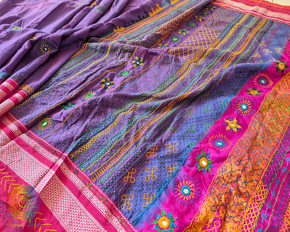 Side view of purple Ilkal cotton saree featuring all-over Lambani hand-embroidered bootas