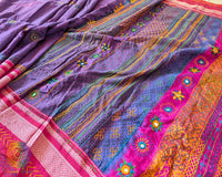 Side view of purple Ilkal cotton saree featuring all-over Lambani hand-embroidered bootas
