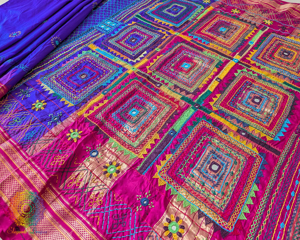 Purple Pure Ilkal Silk Saree with Lambani Hand Embroidery displaying the detailed border and decorative stitching, combining traditional Ilkal weaving with artisan craftsmanship.