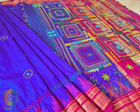 Full view of the Purple Pure Ilkal Silk Saree with Lambani Hand Embroidery, showcasing its rich colour, traditional handloom character and colourful handcrafted detailing.