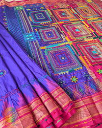 Purple Pure Ilkal Silk Saree with Lambani Hand Embroidery shown in a full open view, highlighting the rich purple silk body and colourful traditional handwork.